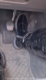 Mandy drives Volkswagen Golf very hard wearing black platform pvc boots